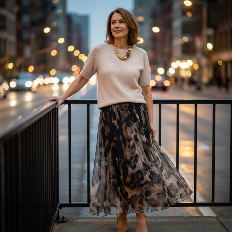 Two-Piece Women's Set Comprising a Sweater and Fluid Leopard Print Skirt