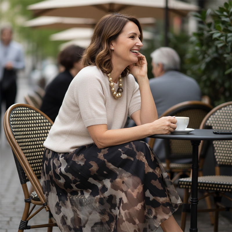 Two-Piece Women's Set Comprising a Sweater and Fluid Leopard Print Skirt